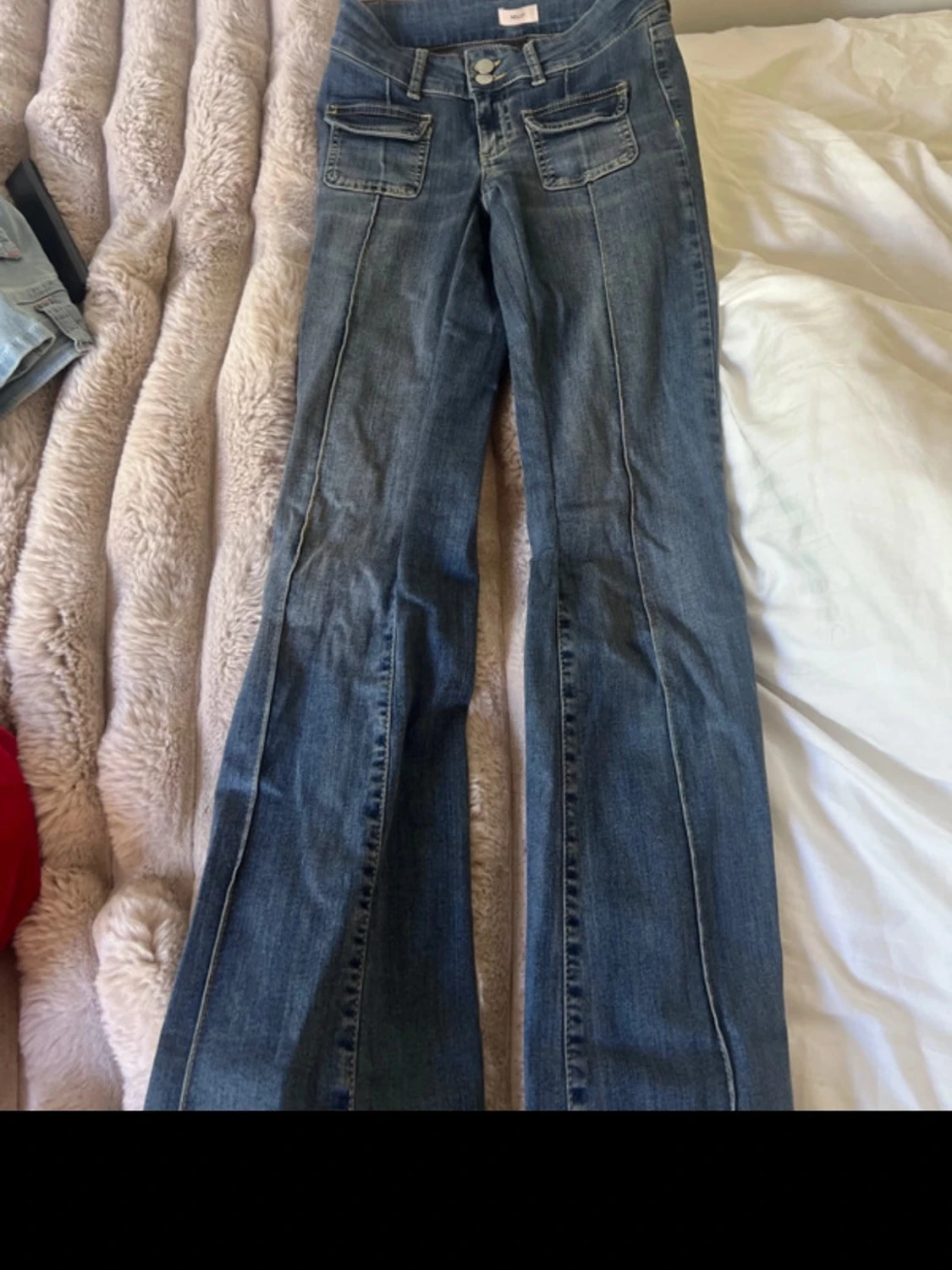 Blå utsvängda jeans från Nelly - 1