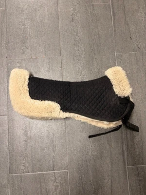 Fluff padd - Fluff padd i bra skick, strl M, nypris 800kr 