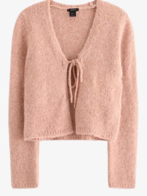 Ljusrosa fluffig kofta med rosett knyte  - Supersöt ljusrosa kofta från Lindex i mjukt, fluffigt material. Koftan har v-ringning, långa ärmar och knytband framtill för en trendig look. Perfekt att slänga över en topp för extra mysfaktor.