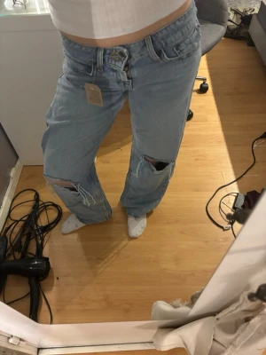 Levi's Superlow Loose jeans, ljusblå -  Aldrig använda baggy jeans från Levis. 
