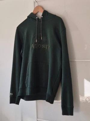 Lacoste hoodie - Nice lacoste hoodie in Dark green colour , size M , worn a few times but it was to small for me i normally wear L. 