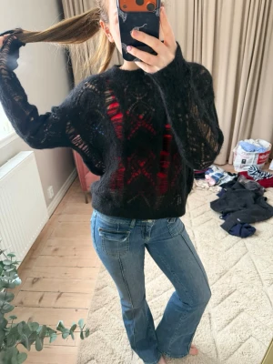 Svart transparent stickad tröja - Supercool! 