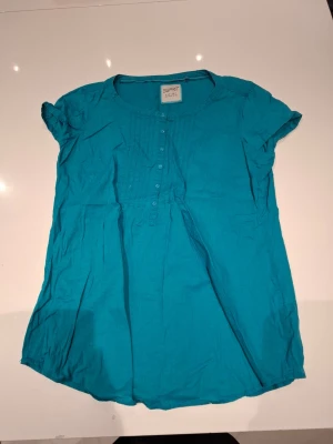 Blå blus - Skriv om du har några funderingar 