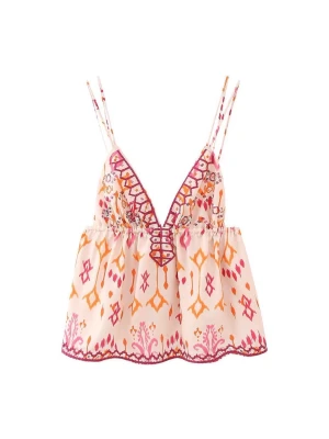 Mönstrad linnetopp med broderi - Säljer en ljus linnetopp med färgglatt mönster i rosa och orange. Toppen har tunna axelband, djup v-ringning med broderade detaljer och dekorativa knytband med tofsar i sidorna. Perfekt för sommarens varma dagar! Lappen sitter kvar