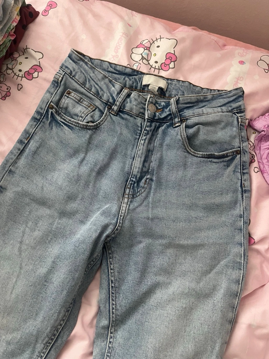 Ljusblå bootcut med hög midja