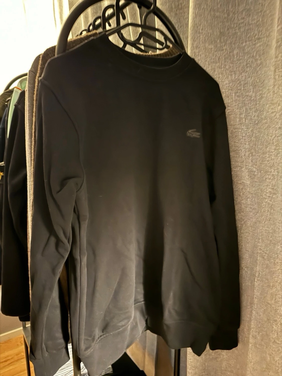 Svart sweatshirt från Lacoste