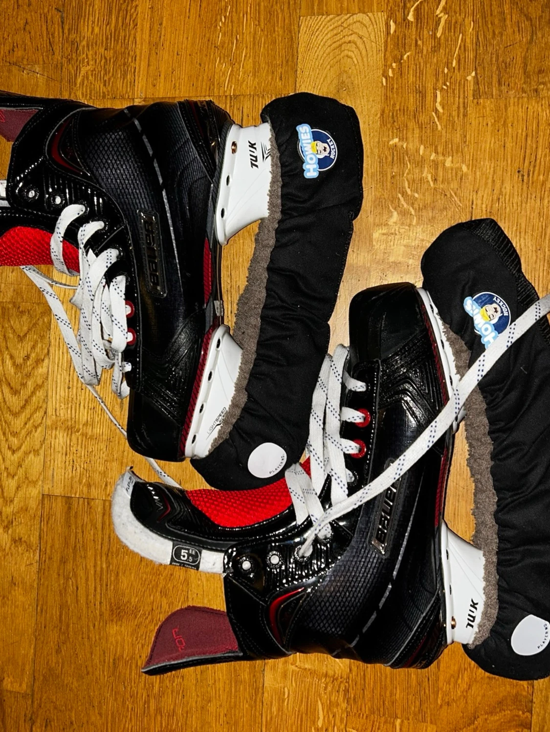 Svarta Bauer hockeyskridskor