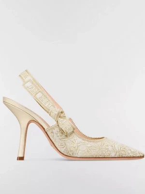 ENDAST 💕1000kr💕 EJ NEDANSTÅENDE - Snygga pumps från Dior i guldig nyans med spetsig tå och broderade detaljer. Skon har en elegant slingback-rem med Dior-logga och hög klack i metallic. Materialet är tyg med exklusiv känsla och vacker struktur. Perfekt för dig som gillar lyxiga detaljer. Helt oanvända säljes pga storlek, finns i både 38 & 39, finns möjlighet att få me kartong och påse vänligen kontakta mig! har även med låg klack💕