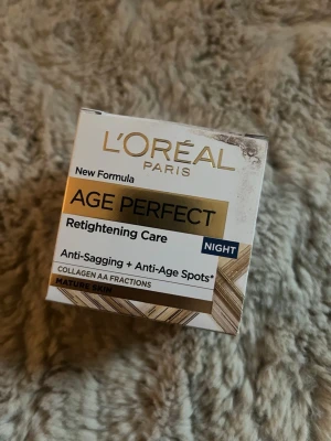 L'Oréal Age Perfect Night Cream - L'Oréal Paris Age Perfect Night Cream är en nattkräm för mogen hud som motverkar slapphet och åldersfläckar. Innehåller kollagen AA-fraktioner. Den är helt oöppnad/oanvänd.