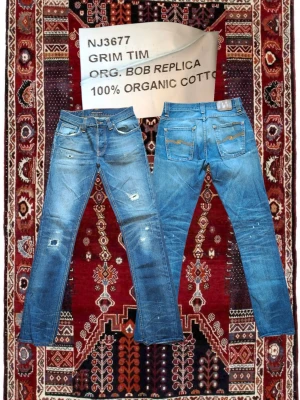 Nudie jeans grim tim w30 l34 - Tjena! Jag säljer nu dessa otroligt snygga nudies I modellen grim tim (slim/straight). Dessa har unika lagningar som bidrar till karaktären sjukt mycket. Sitter som w30 l34. Midja:39cm Längd:108cm Hör av er vid fler frågor!  apc #allsaitsn #avant #bape #blue #blueline #blugi #boot #brand #brothers #bukser #byxor #calm #ciemme #clothes #dark #de #denim #džins #džinsové #džinsowe #džinsy #edwin #efekt #elastanem #elastyczne #evisu #f4f #farmer #farkut #famous #field #five #han #head #heart #hips #