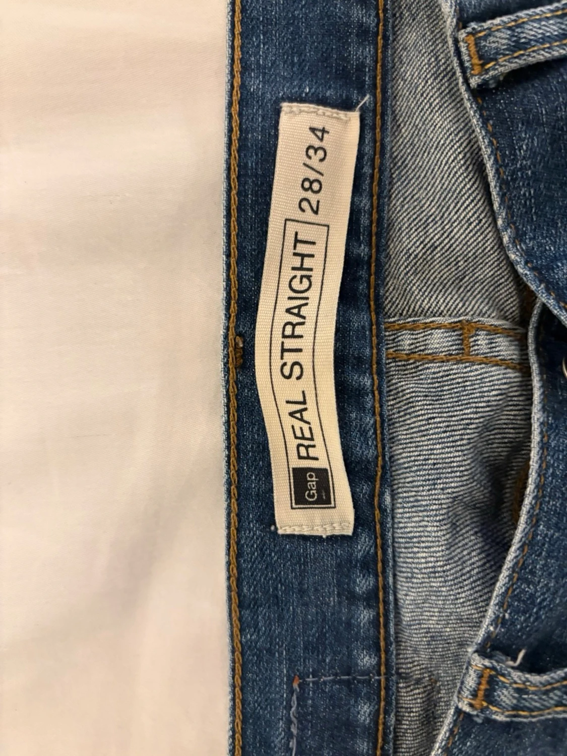 Blå raka jeans med slitningar - 3