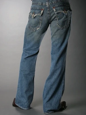 Bootcut True Religion Jeans - Galet snygga vintage bootcut trues i modellen Billy.  Tvätt/färg: Medium Vintage Skick: Väldigt bra - nästintill nyskick Storlek: 27 Kön: Herr - men passar unisex | Snygg fabriksgjord distressing | Made in USA | Mycket bättre kvalitet än de nyproducerade varianterna | Hör av er vid ytterligare frågor!