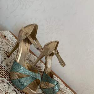 Glittering heels only used used once with a matching dress 