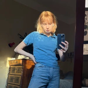 Nike t-shirt vintage - Ljusblå t-tröja från Nike. Köpt second hand men fint skick! Liten i storleken.