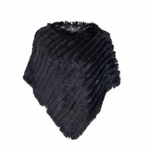 päls poncho - äkta päls poncho köpt på miinto för 600kr, säljs för den kommer inte till användning, använd ett fåtal gånger.