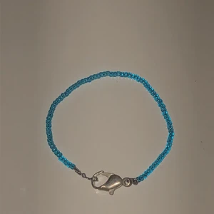 Seabead armband- blå - Seabead armband i färgen blå. Gjord för hand <3