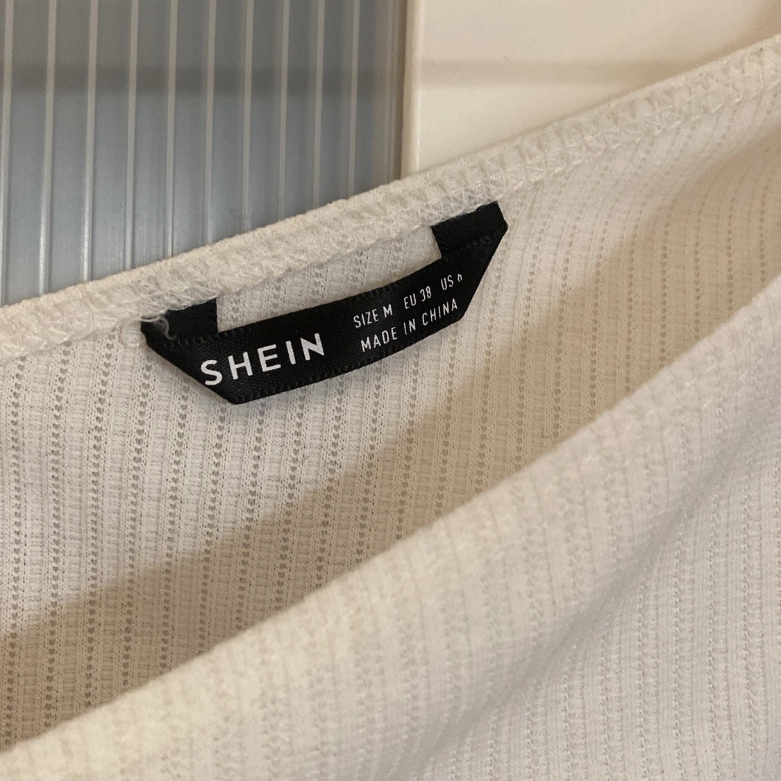 Topp med en ärm - 91