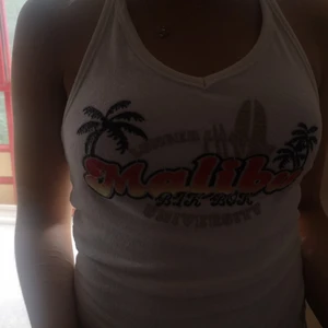 Topp - Jätte söt halterneck linne  i velour i storlek S