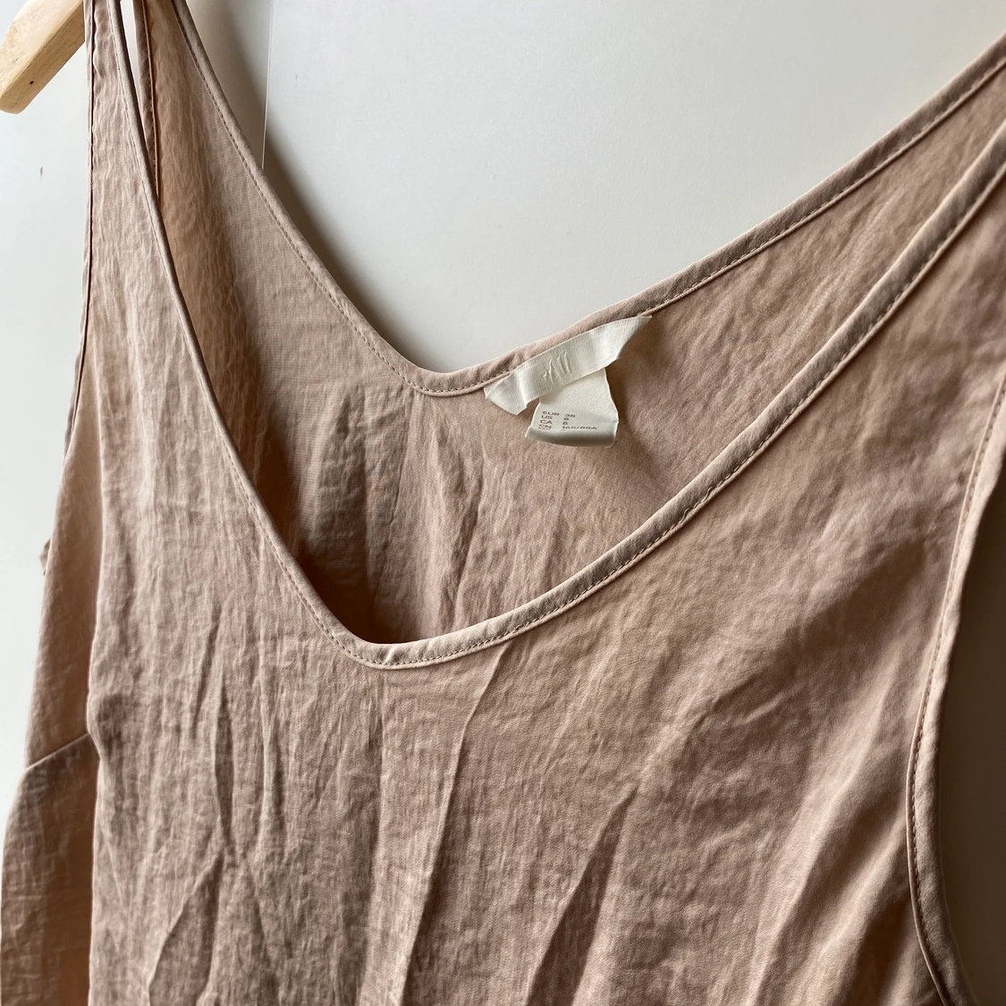 Oanvänt linne från H&M strl 38 - 90