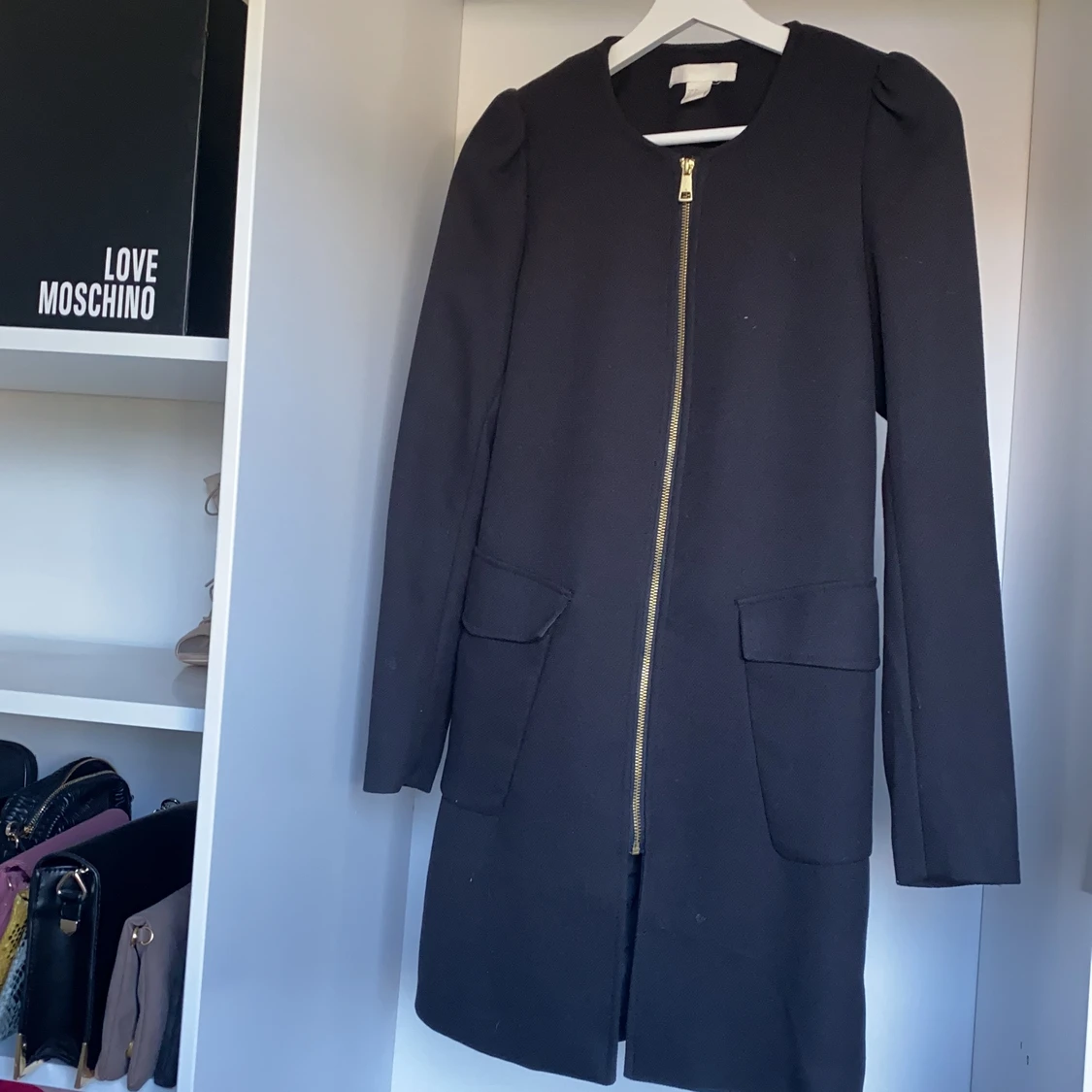 Oanvänd kappa storlek 34