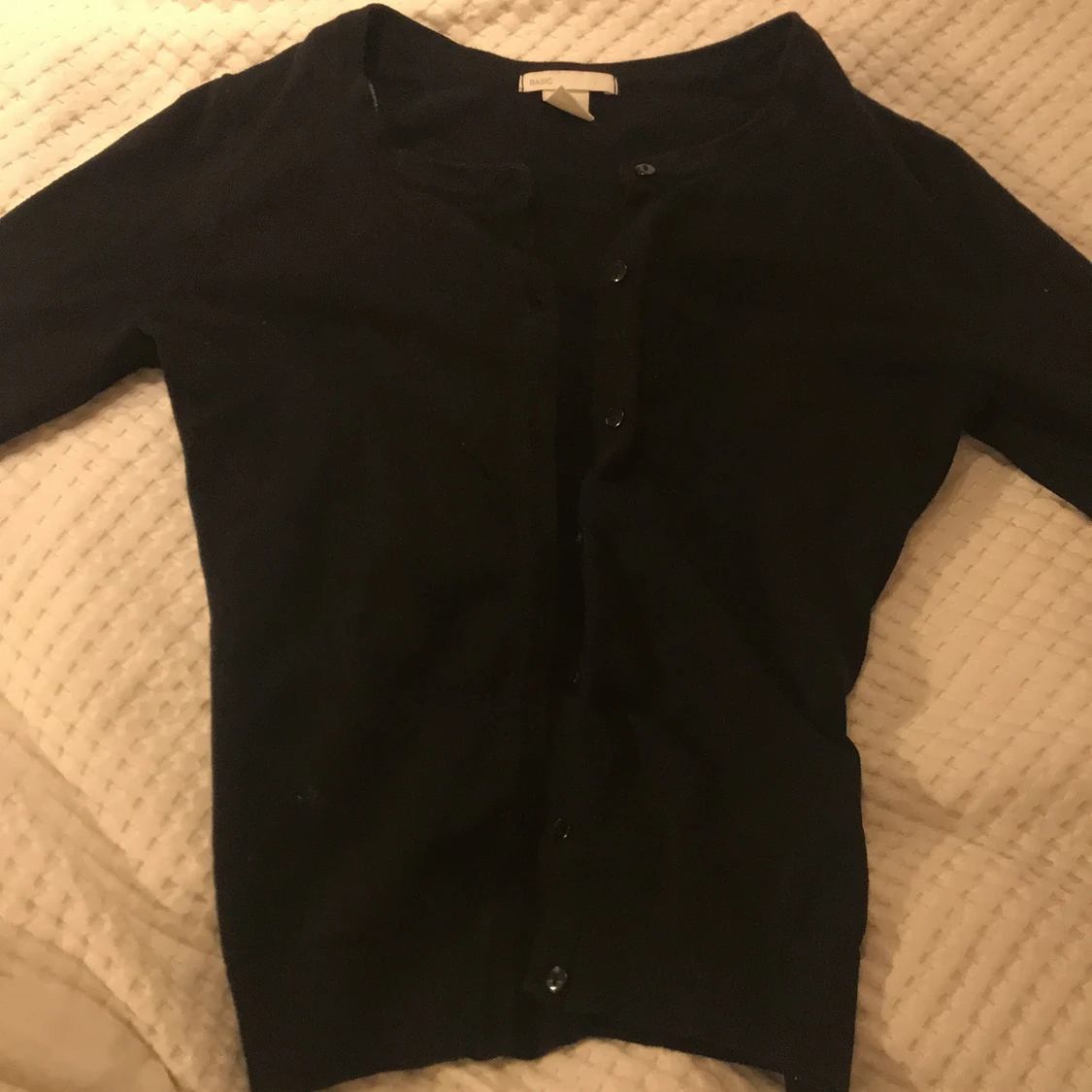 Svart kofta med knappar - 91