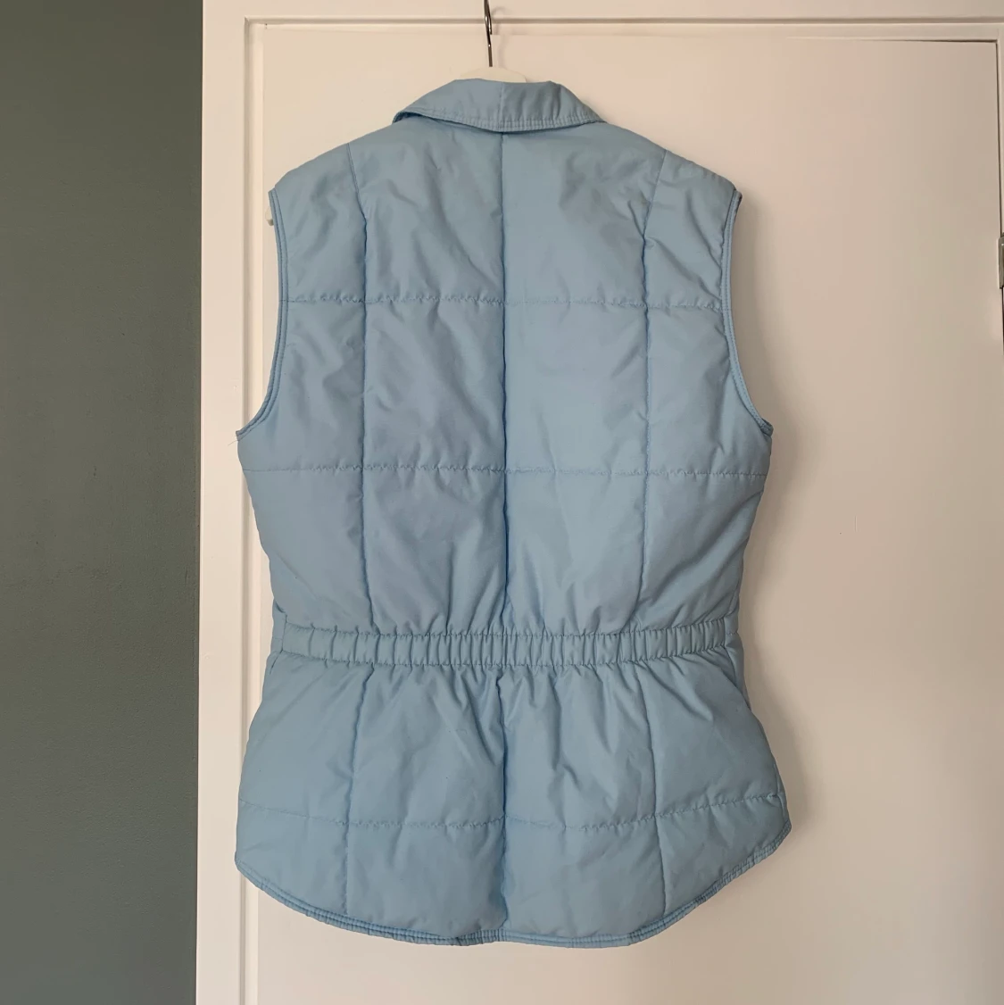 Blå dunväst - 90