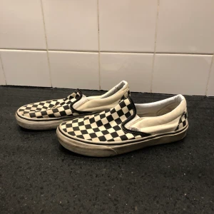 Vans  - Vans slip on. 