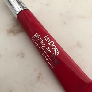 Lipgloss - Superfint lipgloss från isadora som är oöppnad! Färg: 62 poppy red. Gratis frakt!