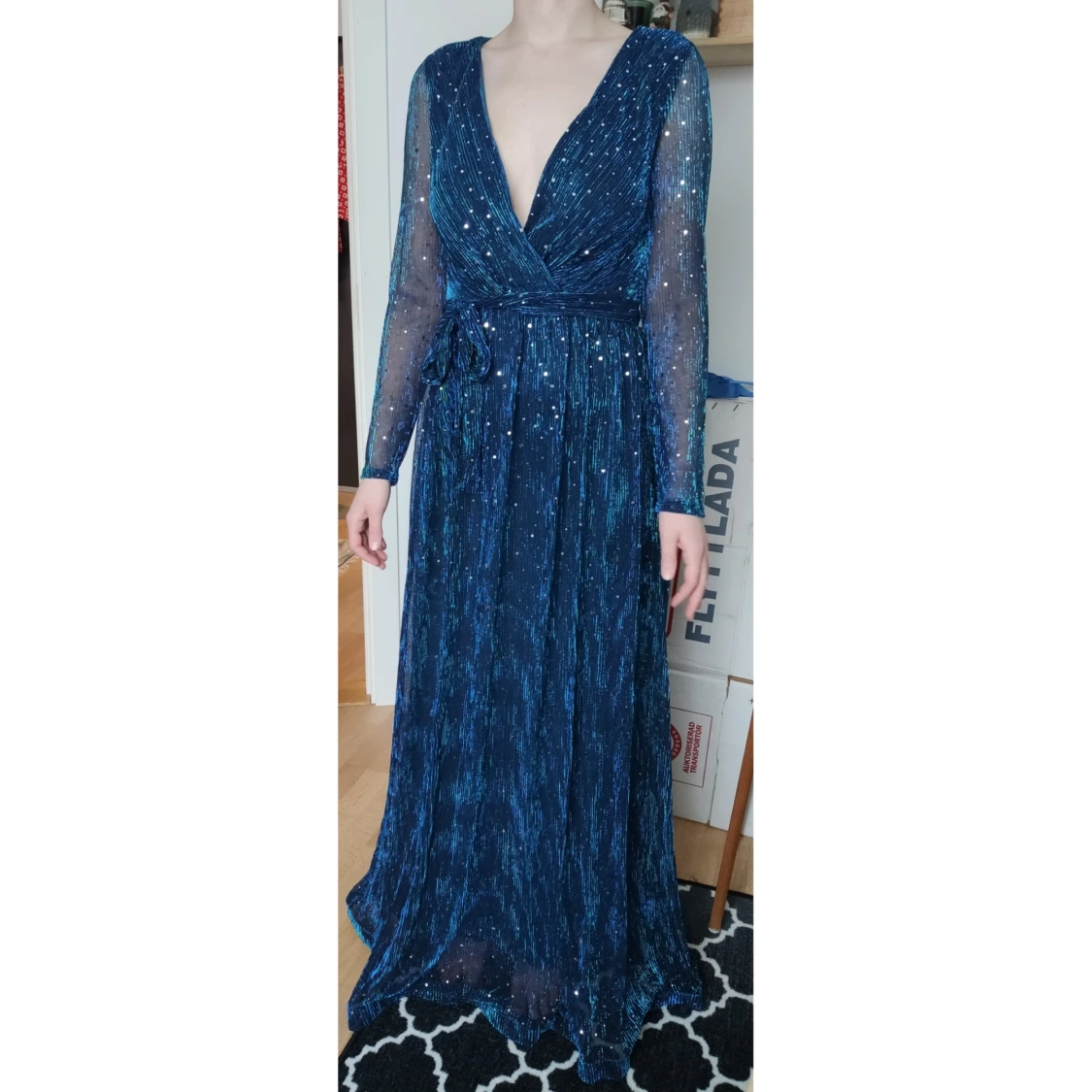 Blå/turkos glittrig långklänning