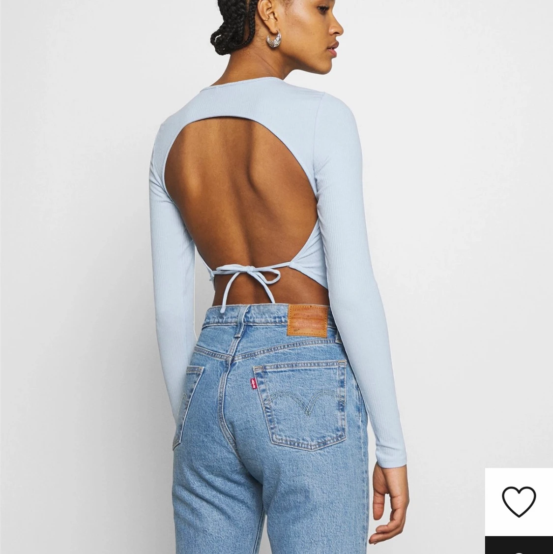 En ljusblå tröja i storlek xs-s  - 90