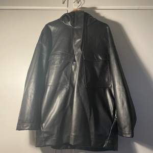 HM Imitation leather rain jacket with hood. Deep pockets. Perfect condition. 