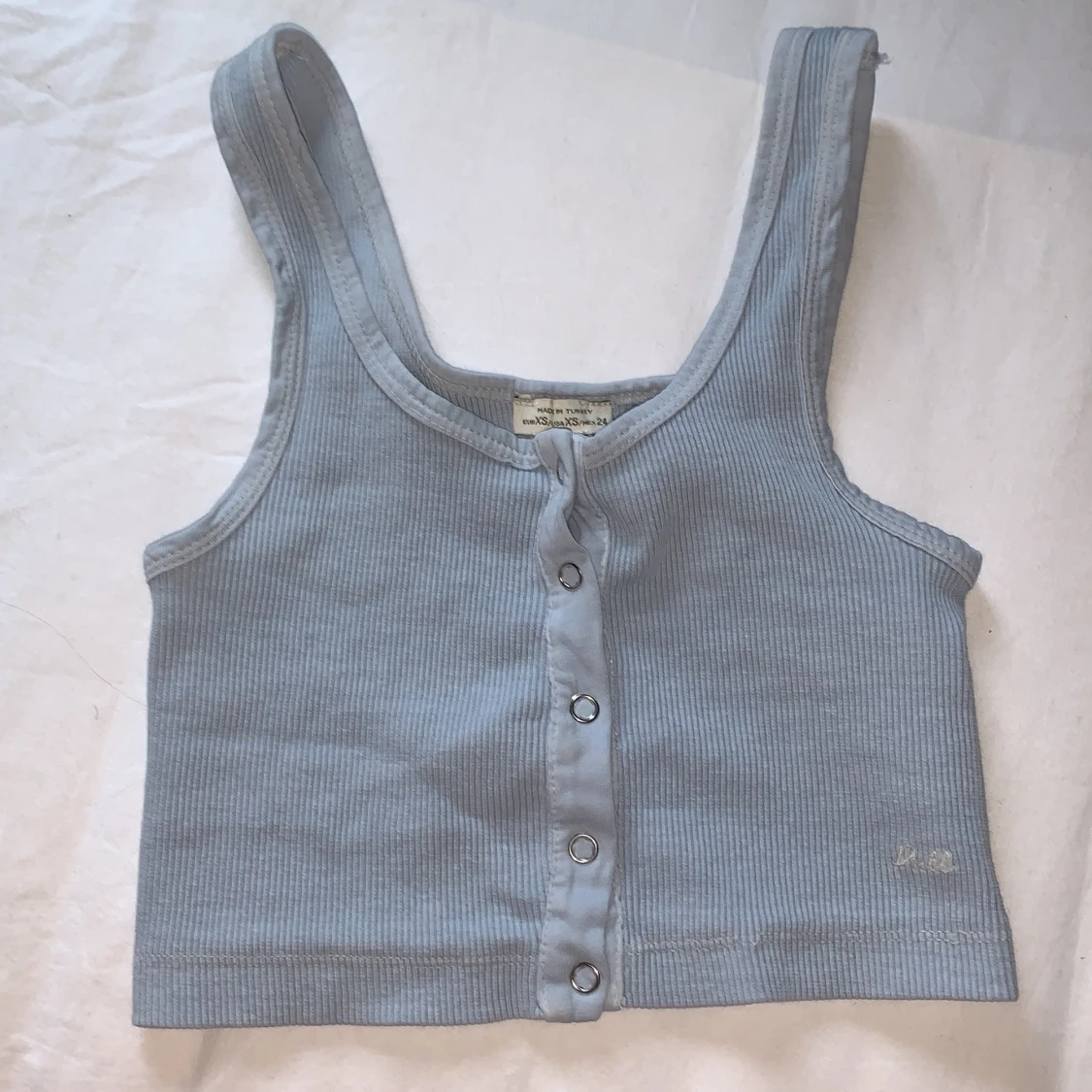 Blått linne med knappar - 90