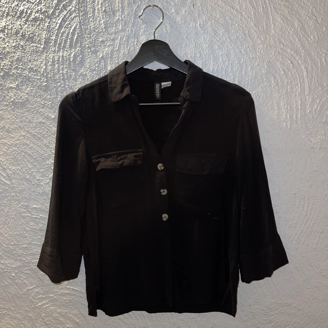 Blus från H&M i storlek 34/XS