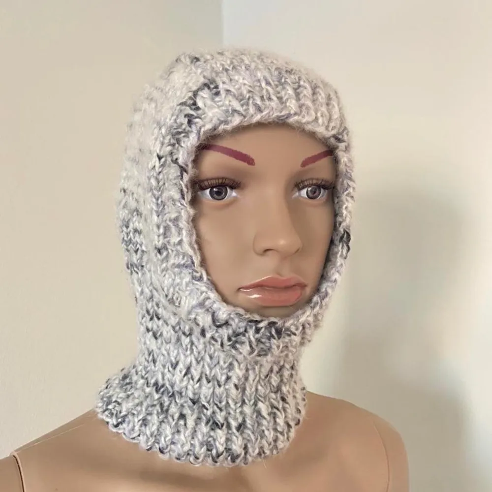 Handmade adjustable balaclava in white mohair and premium acrylic. One size fits all. This one is extra thick, perfect for cold winter days ☃️  Prices are reflected by quality & cost of the yarn🌻 One balaclava takes on average 6 hours to knit 🧶  Lifetime warranty ♻️. Accessoarer.