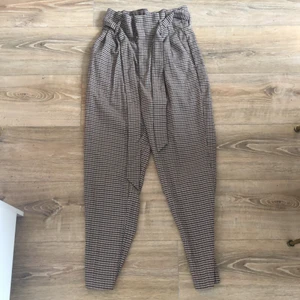 Rutiga byxor  - Rutiga byxor, oanvända.