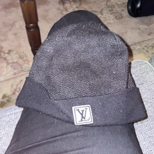 Louis Vuitton möss  - Lägg Bud 