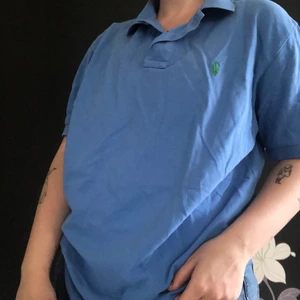 Polo Ralph lauren pike - Blå Ralph lauren polo pike i fint skick, använd fåtal gånger