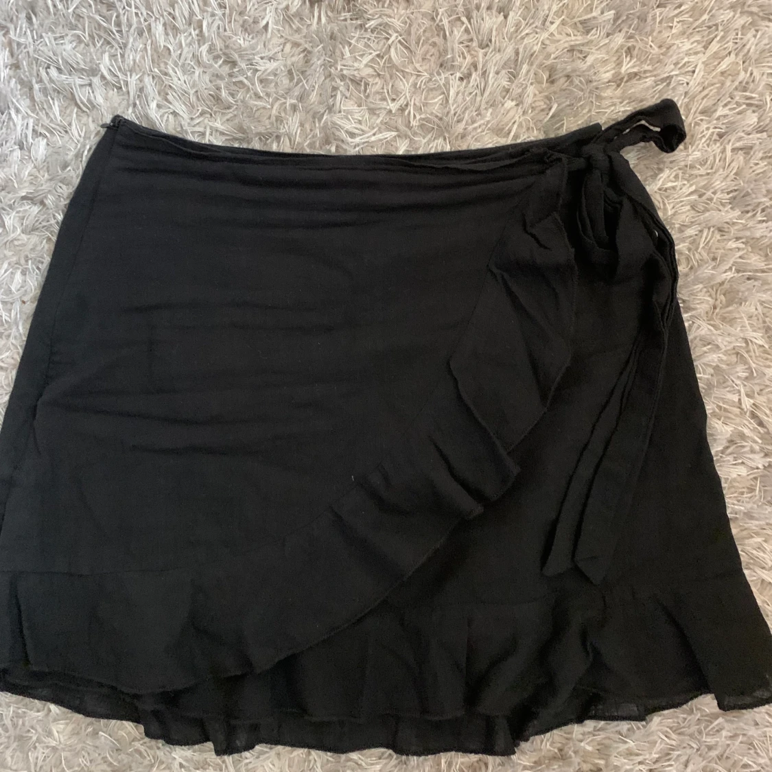 Svart omlottkjol  - 90