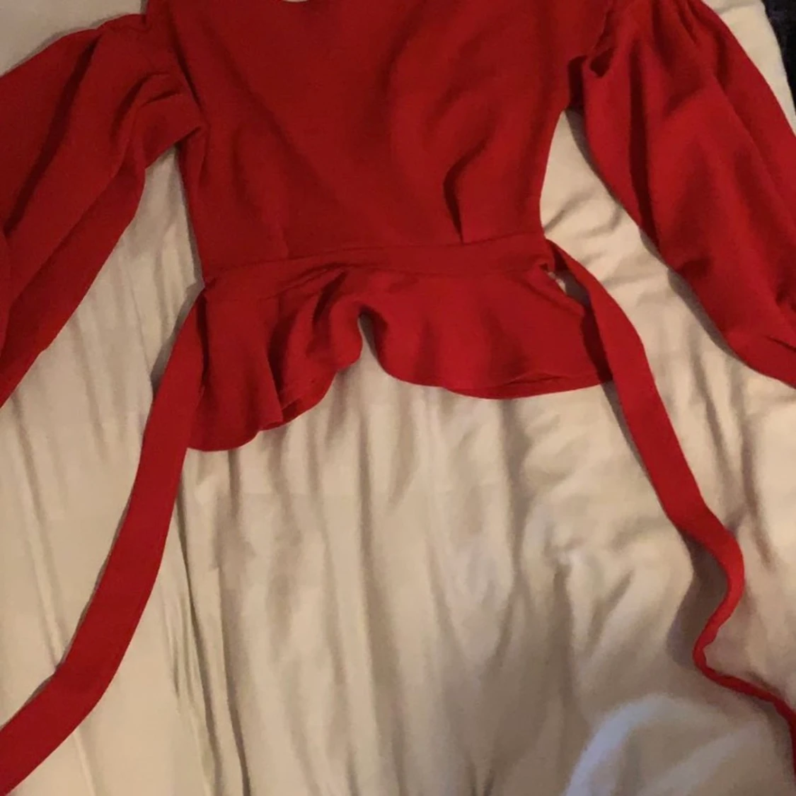 En röd tröja i stolk S  - 90