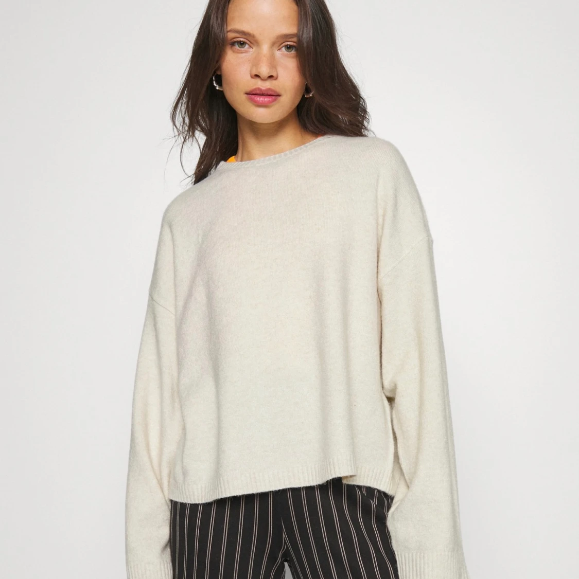 Beige stickad tröja