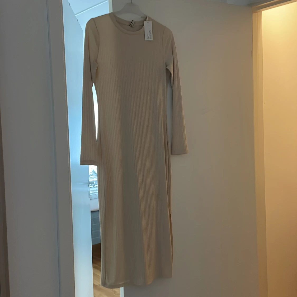 Stickad/ ribbad klänning