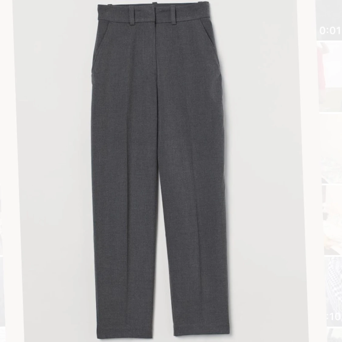 Grå kostymbyxor