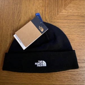 Helt ny The North Face mössa - Kvittot gick ut så hann inte lämna tillbaka den.