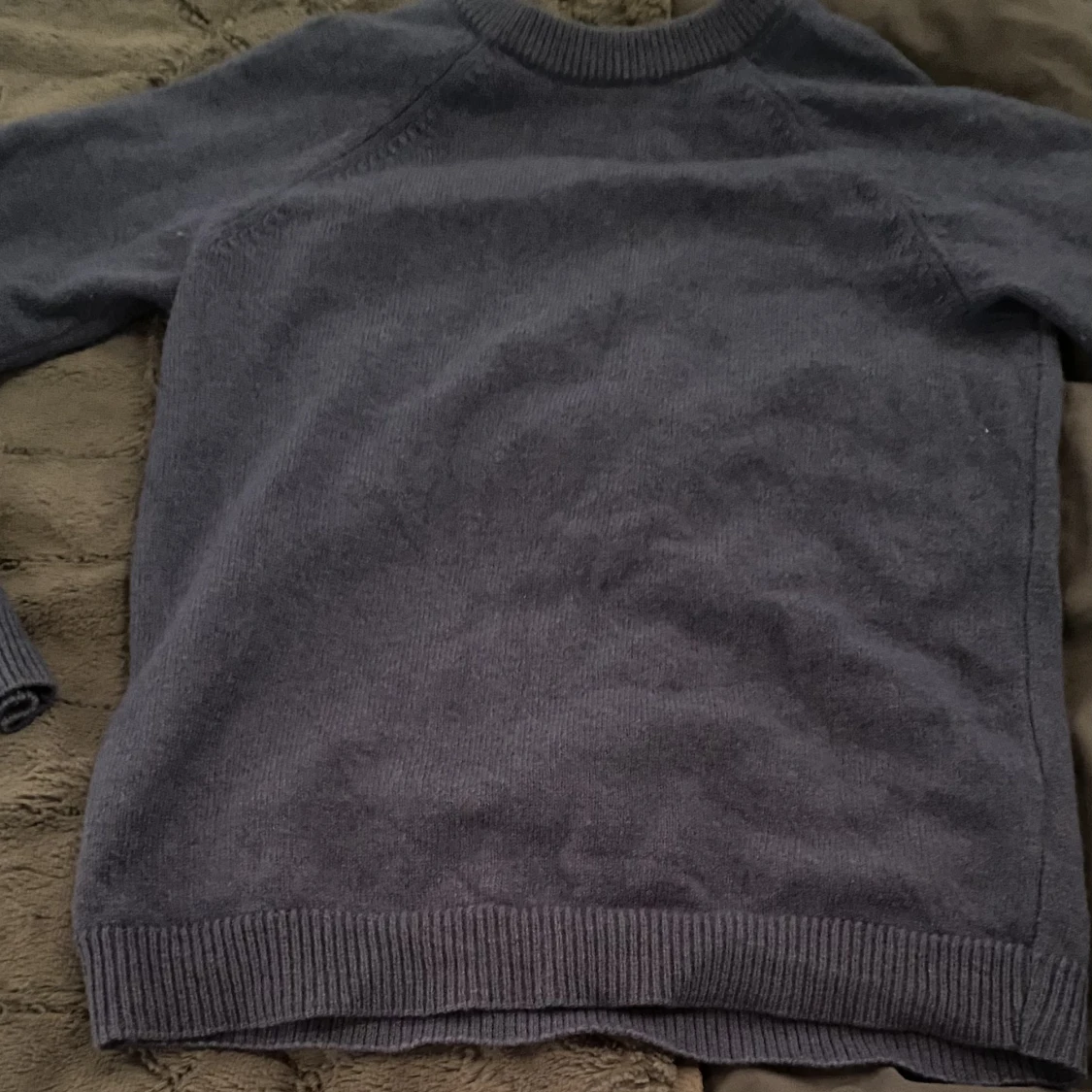 Blå stickad tröja