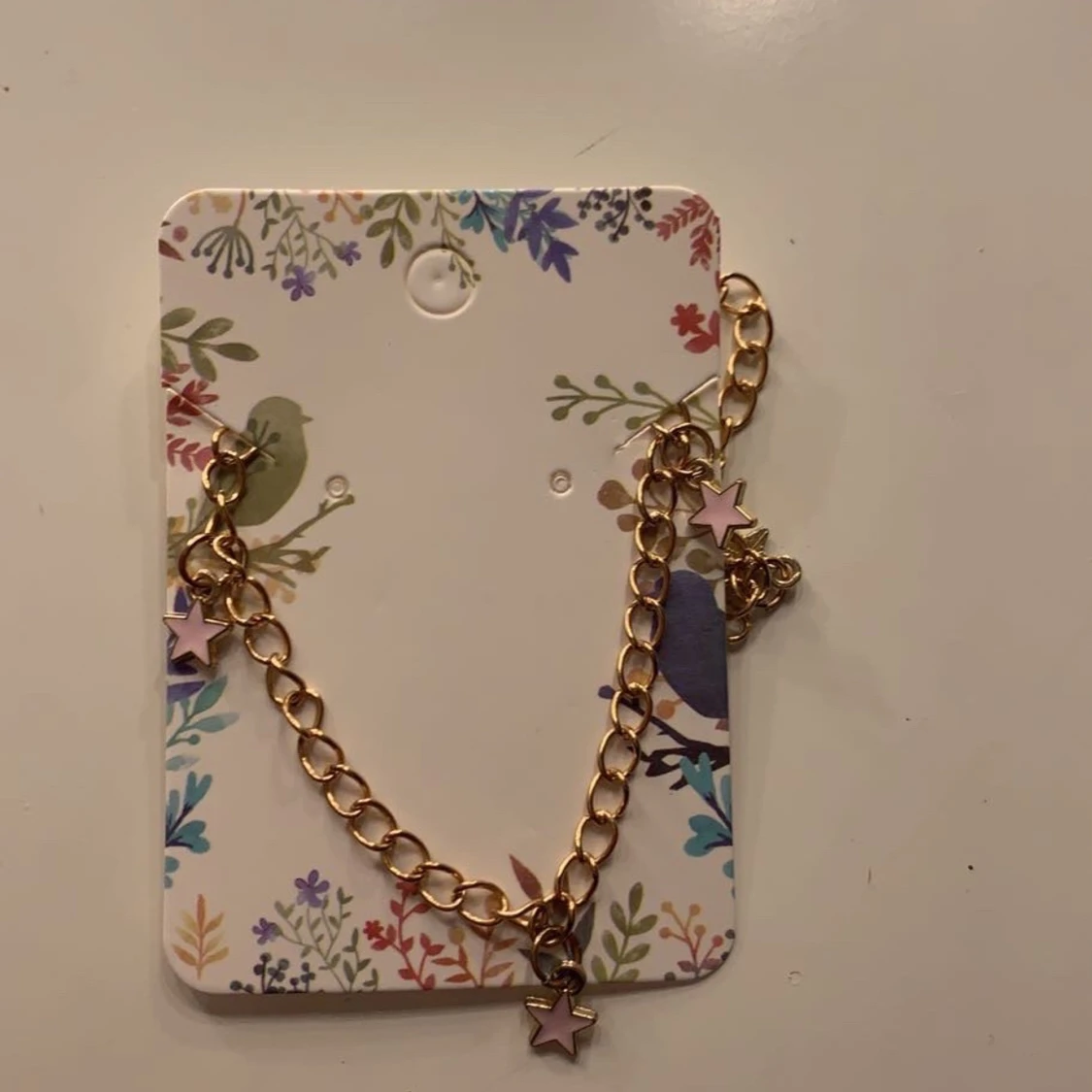 Stjärn halsband med rosa stjärnor på