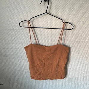 Top - Brun/orange top, knappt använd.