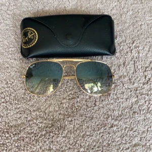 Ray-Ban - Nyskick Metallbåge guld