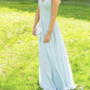 Balklänning - Öppen i ryggen, storlek xs. Använd en gång men som ny. Köpt för 1100 