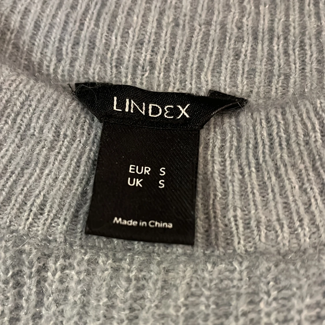 Blå stickad tröja - 90