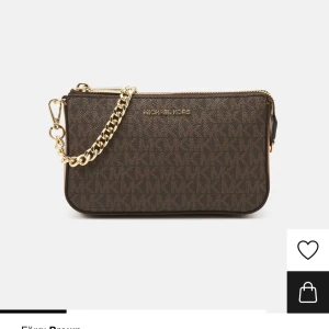 Michealkors handväska äkta - Helt ny aldrig använd, certifikat på äkthet medföljer. 500 kronor. Kan fraktas och mötas upp i gbg. 